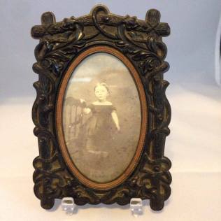this frame holds a CDV sized image and is has a patent date of 1855